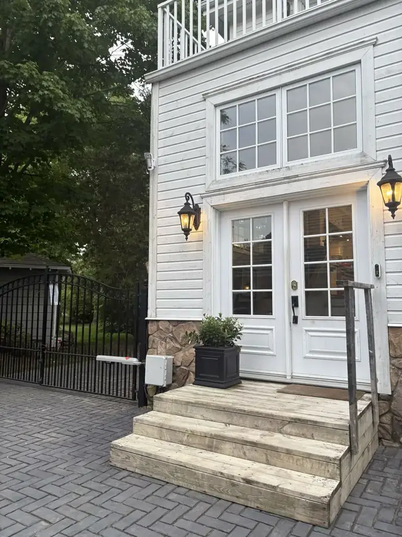 Front porch and steps after pressure washing — full view of restored finish